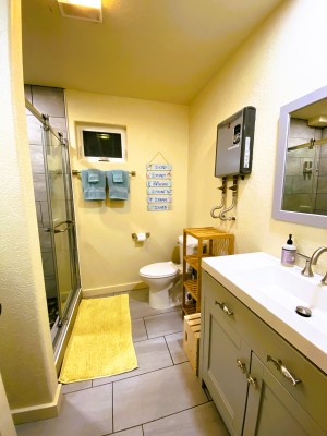 Downstairs bathroom with shower stall only.