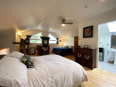 Upstairs bedroom suite - one queen, one full bed.  Bluetooth treadmill. Adjoining bath